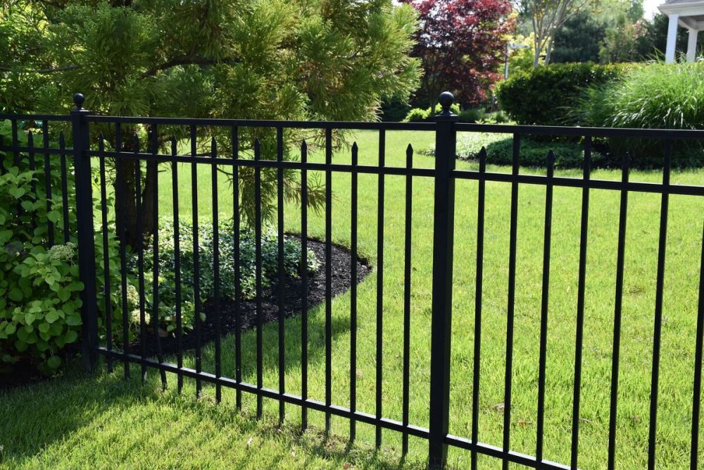 Black aluminum covered spear fence