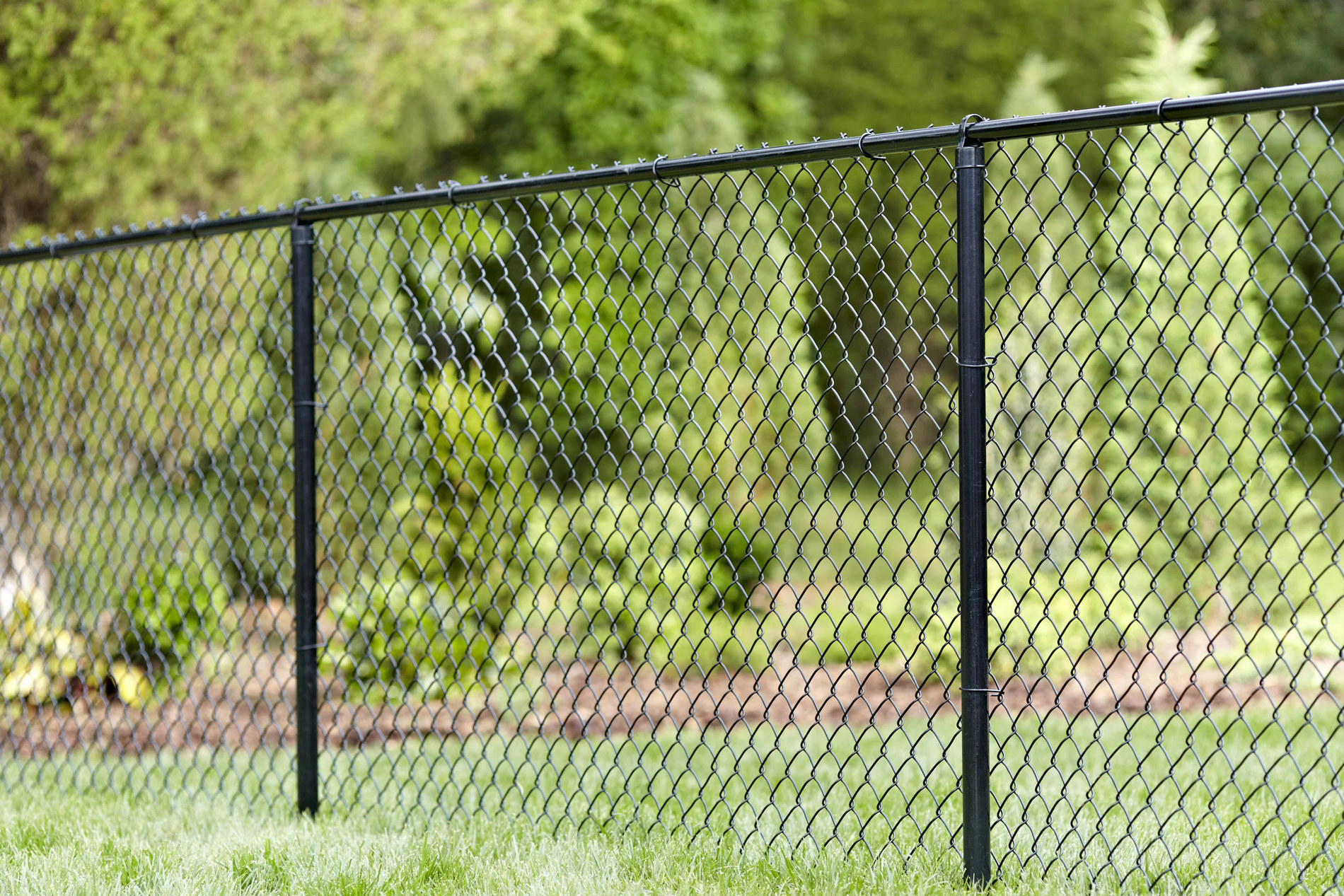 Black vinyl covered chainlink fence