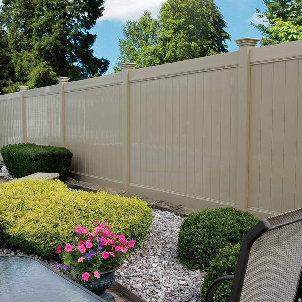 Tan vinyl privacy fence